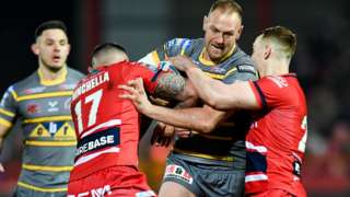 Castleford forward Liam Watts is held by Hull KR pair Elliot Minchella and Frankie Halton