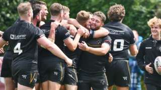 Cornwall players celebrate a try