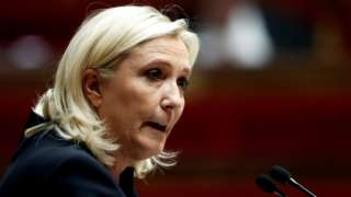 Marine Le Pen, member of parliament and leader of French far-right National Rally (Rassemblement National) party, delivers a speech during a debate on immigration at the National Assembly in Paris, France, October 7, 2019
