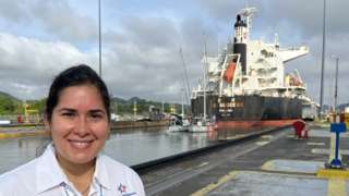 Mahelis de García, a guide at the Panama Canal, poses for a photo