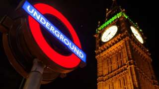 London Underground roundel next to Big Ben