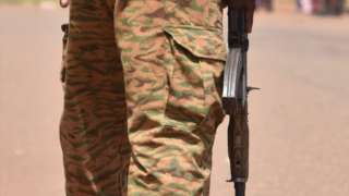A Burkina Faso's soldier patrols to ensure security measures during the Burkina Faso's cycling tour, in Ouahigouya, on October 29, 2018.