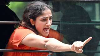 Sangeeta Phogat during wrestlers' protest march towards new Parliament building, on May 28, 2023 in New Delhi, India. The Delhi Police detained protesting wrestlers when they breached the security and tried to march towards the new parliament building.