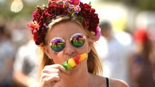 Woman with a lolly at a festival