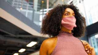 Office worker in mask