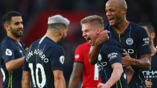 Manchester City players celebrate