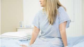 Woman in doctor's office for check up