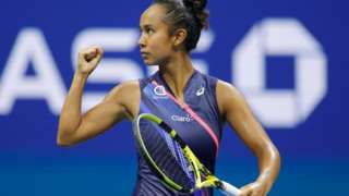 Fernandez holding her racket