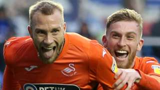 Mike van der Hoorn and Oli McBurnie celebrate