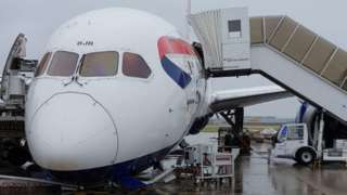 BA plane with nose tipping forward