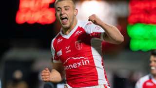 Mikey Lewis leaps in the air after scoring for Hull KR versus Saints