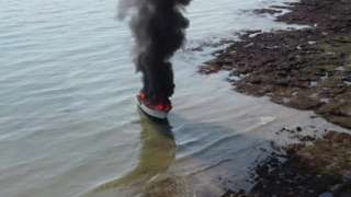 Boat on fire