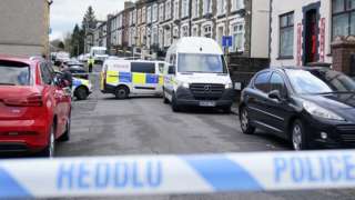 Police at the scene of the stabbing on Moy Road, Aberfan, Merthyr Tydfil