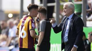 Bradford boss Mark Hughes gives instructions