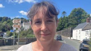 Sally stood by the road where the near miss happened