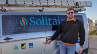 Paul Corrigan and a drill hole in his van