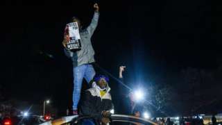 Protesters confront law enforcement outside Brooklyn Center police HQ - 13 April