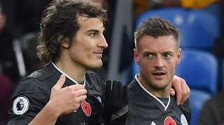 Caglar Soyuncu (left) and Jamie Vardy
