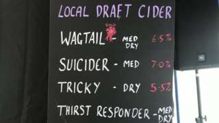 cider board at Otter brewing's tent