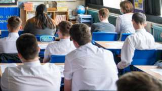 Pupils sitting in a classroom