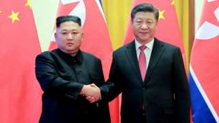 Kim Jong-un and Xi Jinping shakes hands in Beijing (Jan 2019)