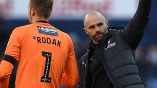 Rotherham goalkeeper Marek Rodak and manager Paul Warne