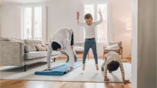 Family exercising at home