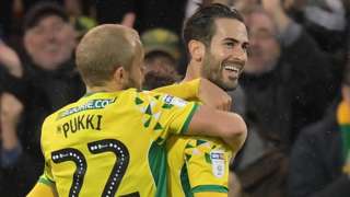 Norwich celebrate Mario Vrancic's opening goal against Bolton