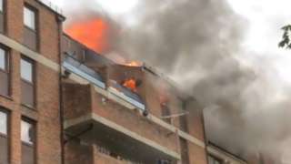 Flames in top floor flat