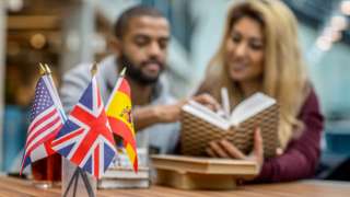 Students behind flags