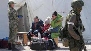 Evacuees at Russia's Bezimenne camp just east of Mariupol, 1 May 22