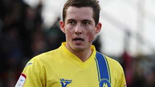 Damon Lathrope in action for Torquay United