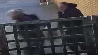 Woman escaping after a man assaulted her in Stamford Hill