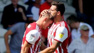 Brentford celebrate Sergi Canos' goal