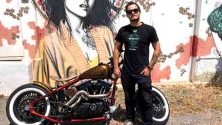 Ben Garland with motorbike