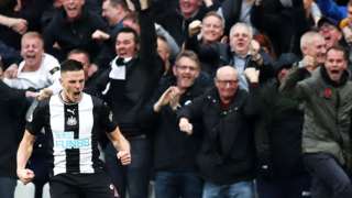 Newcastle celebrate Ciaran Clark's goal