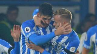 Christopher Schindler (left) celebrates Huddersfield's goal