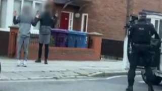 Footage of officers stopping the men in Toxteth