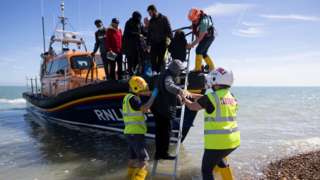 RNLI help people off a rescue boat