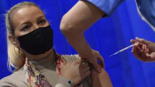 A woman gets the Covid vaccine in Cardiff