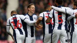 West Brom players celebrate going 1-0 against Ipswich
