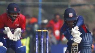 USA bat against Nepal