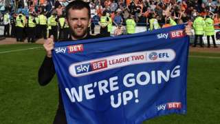 Luton Town manager Nathan Jones celebrates promotion