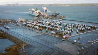 Irish ferries roll on roll off ferry Ulysses unloads as Stena Adventurer arrives in Holyhead port on 2 January