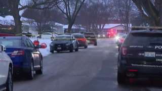Police at the scene of shootings in Joliet, Illinois