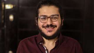 File photo showing Patrick Zaki in Cairo after a court ordered his provisional release (7 December 2021)