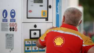 Shell worker at petrol station