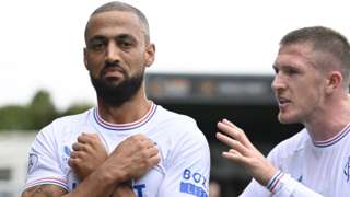 Rangers players Kemar Roofe and John Lundstram celebrate a Roofe goal