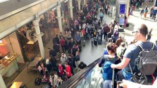 Queues of people at St Pancras International train station