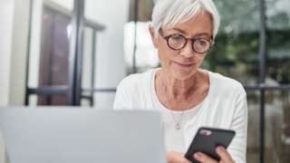 Older woman using smartphone